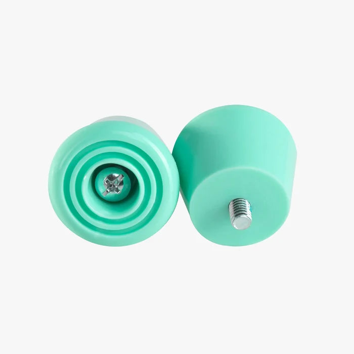 Two green stoppers on a white background