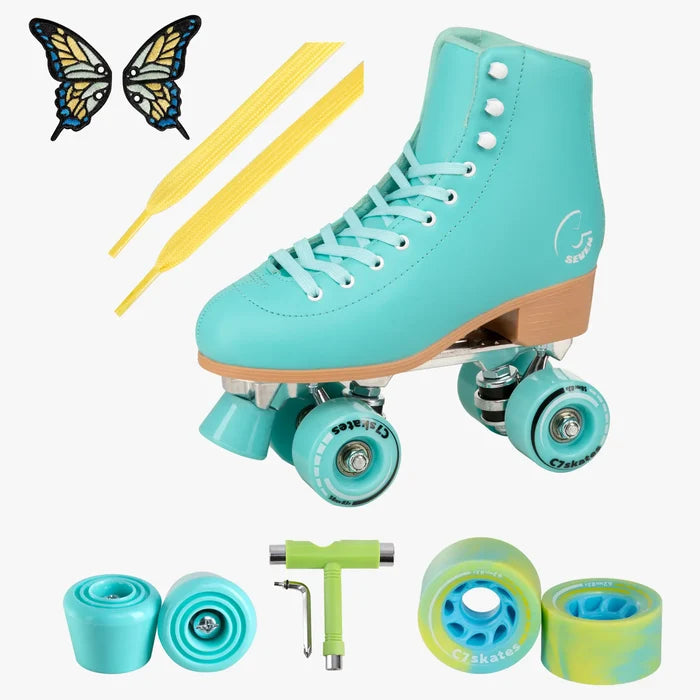 Turquoise roller skate with accessories on a white background.