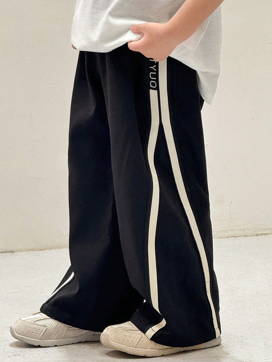 1 Piece Young Boy Japanese And Korean Loose Fit Ribbon Decorated Cuff Black Trousers Suitable For Birthday Parties,Evening Performances,Weddings
