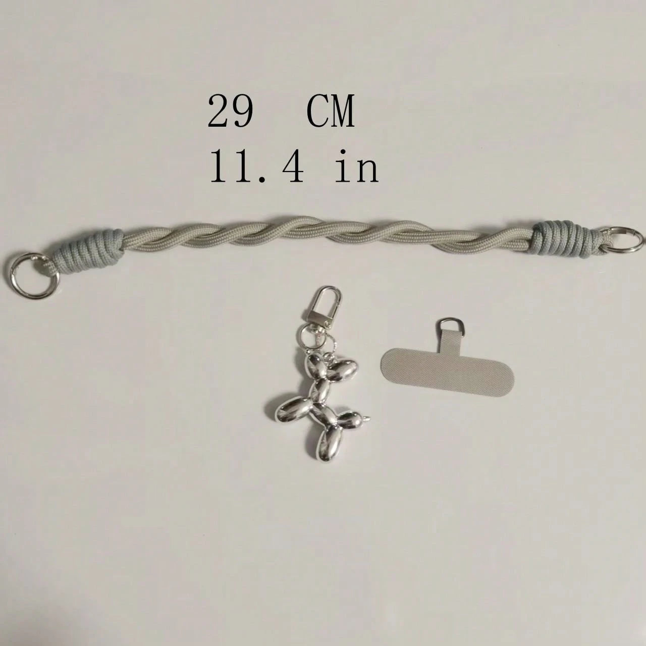 1pc Black Puppy Plush Phone Lanyard, Nylon Short Wrist Phone Strap, 6mm Solid Color Braided Dirt-Resistant Cord, Handheld Key Chain