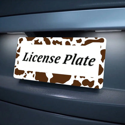 2D Flat Design, Single Piece, For Decorative Purposes Only, Featuring A Cow Pattern License Plate Frame With An Attractive Animal Design On A White Background, Complete With Black Spots.This Car Decor