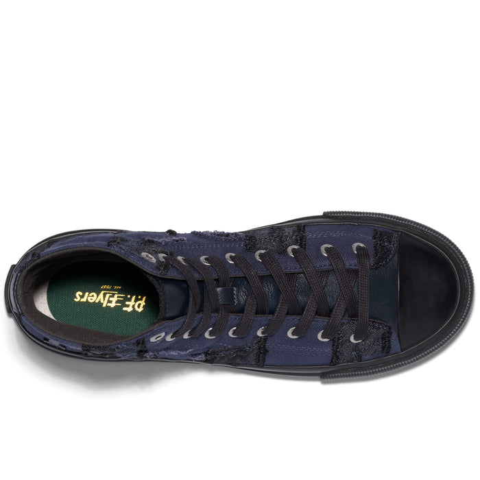 Navy blue sneaker with lace-up design on a white background