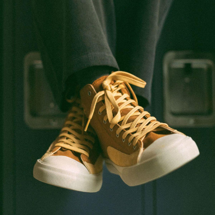 Gold high-top sneakers retro look