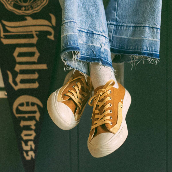Vintage inspired gold low-top sneakers
