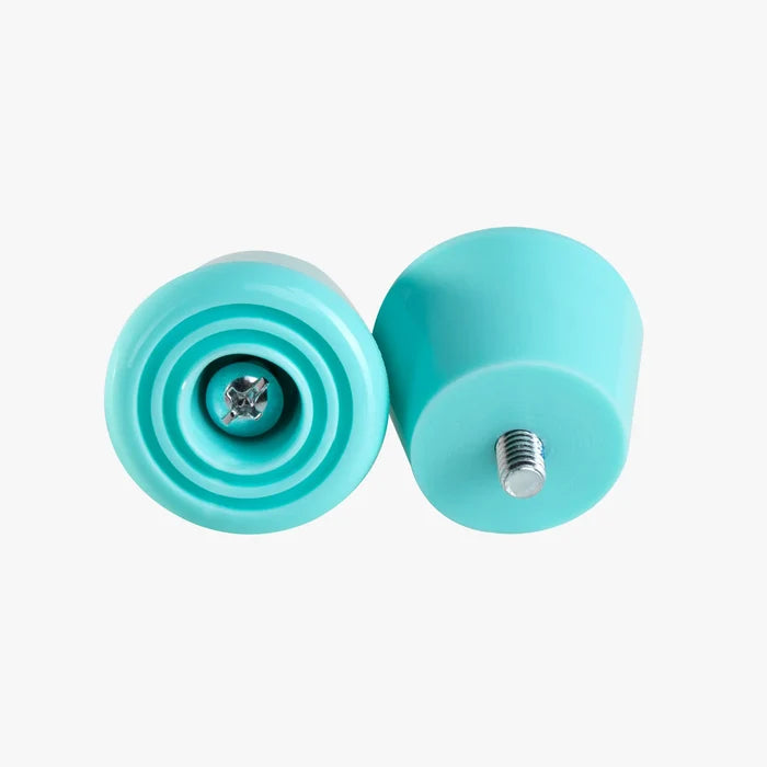 Two turquoise stoppers on a white background