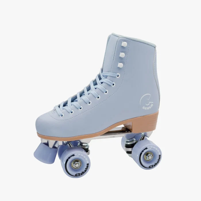 Light blue roller skates with brown soles on a white background