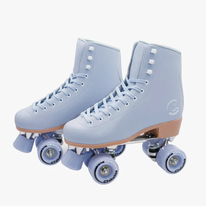 Pair of light blue roller skates with brown soles on a white background