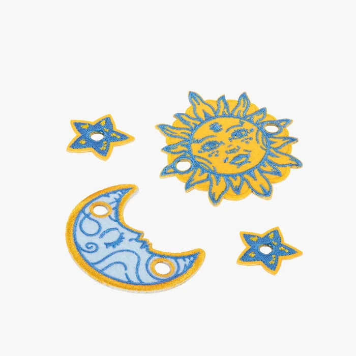 Decorative sun, moon, and star charm set