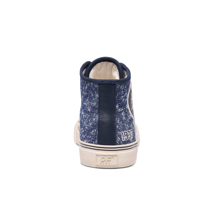 Navy blue high-top sneaker with white sole on a white background