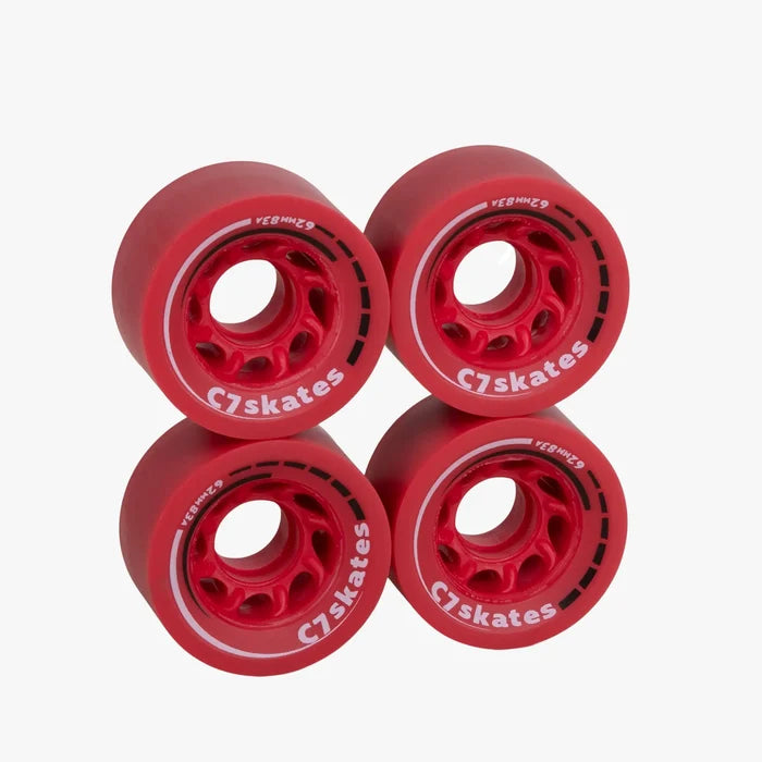Four red C7 skates wheels on a white background