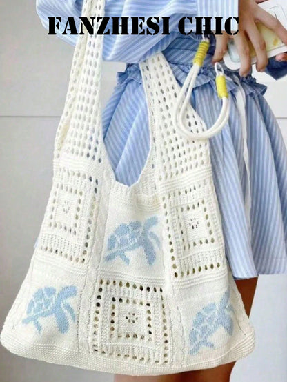 Cream White Hollow Crochet Patchwork Shoulder Bag, Decorated With Light Blue Floral Embroidery. This Large Capacity Knitted Shoulder Bag Is An Ideal Choice For Summer Vacations, A Must-Have Item For S