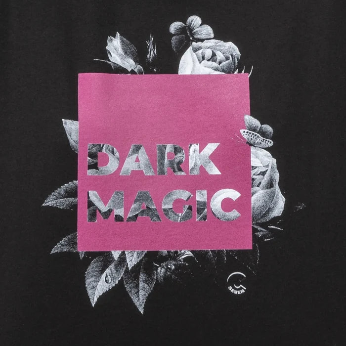 Black t-shirt with 'Dark Magic' text on a pink square surrounded by black and white floral designs.