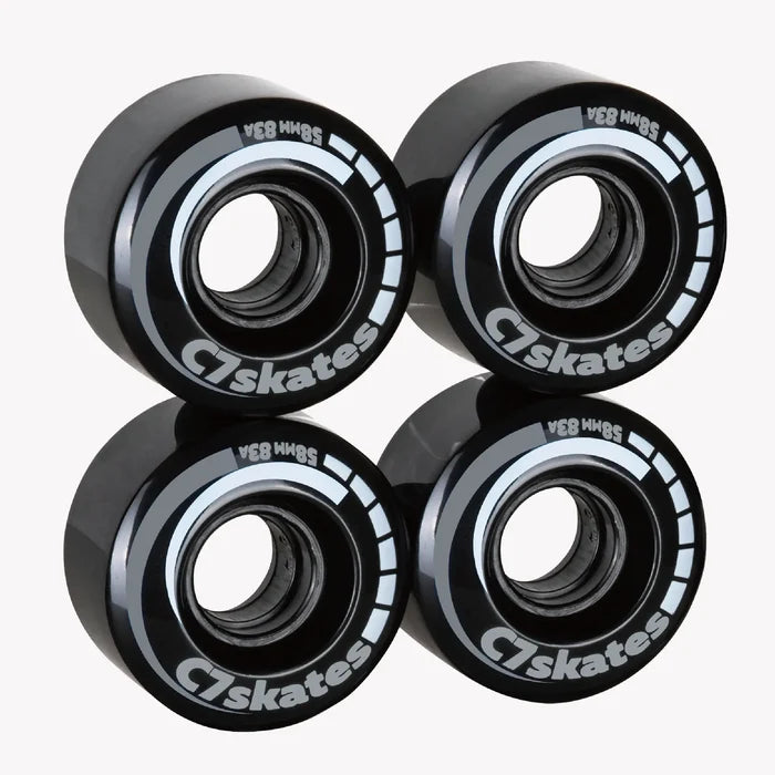 Four black C7 skates wheels on a white background