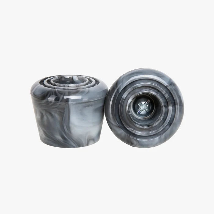 Two gray marbled stoppers on a white background