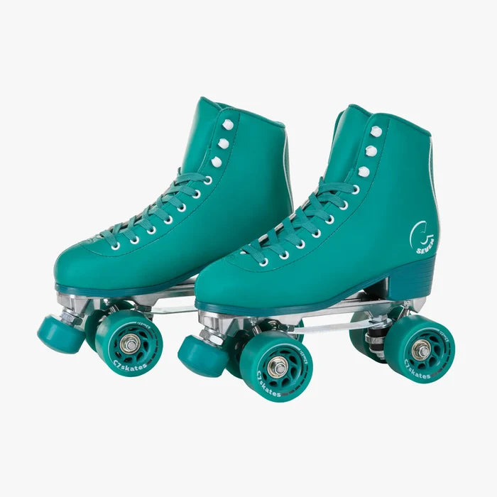 Pair of teal roller skates on a white background