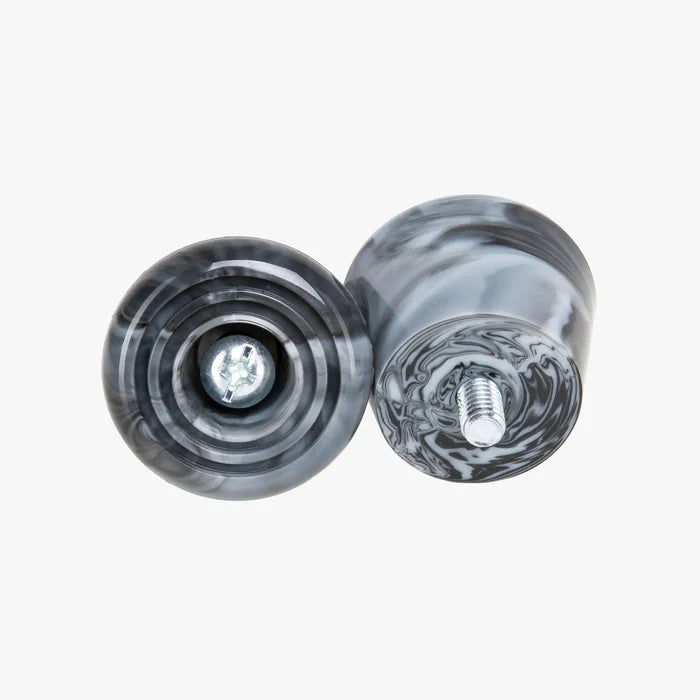 Two marble stoppers on a white background