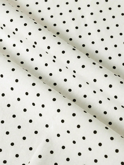 Franclia Women's White Fabric Short Skort With Asymmetrical Polka Dot Design Perfect For Parties