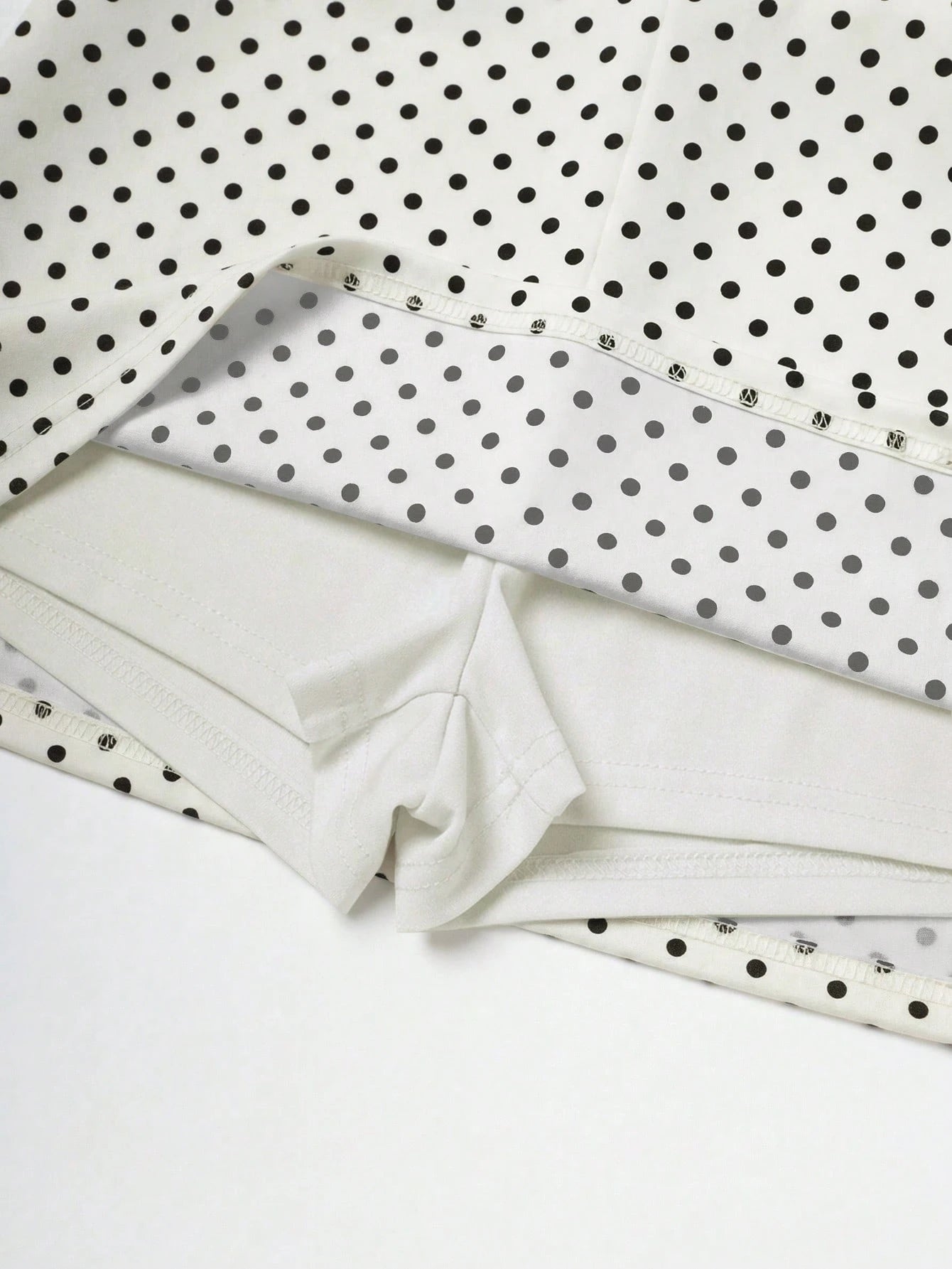 Franclia Women's White Fabric Short Skort With Asymmetrical Polka Dot Design Perfect For Parties