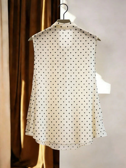 GlowEve Women's Polka Dot Print Tie Collar Ruffle Hem Sleeveless Blouse