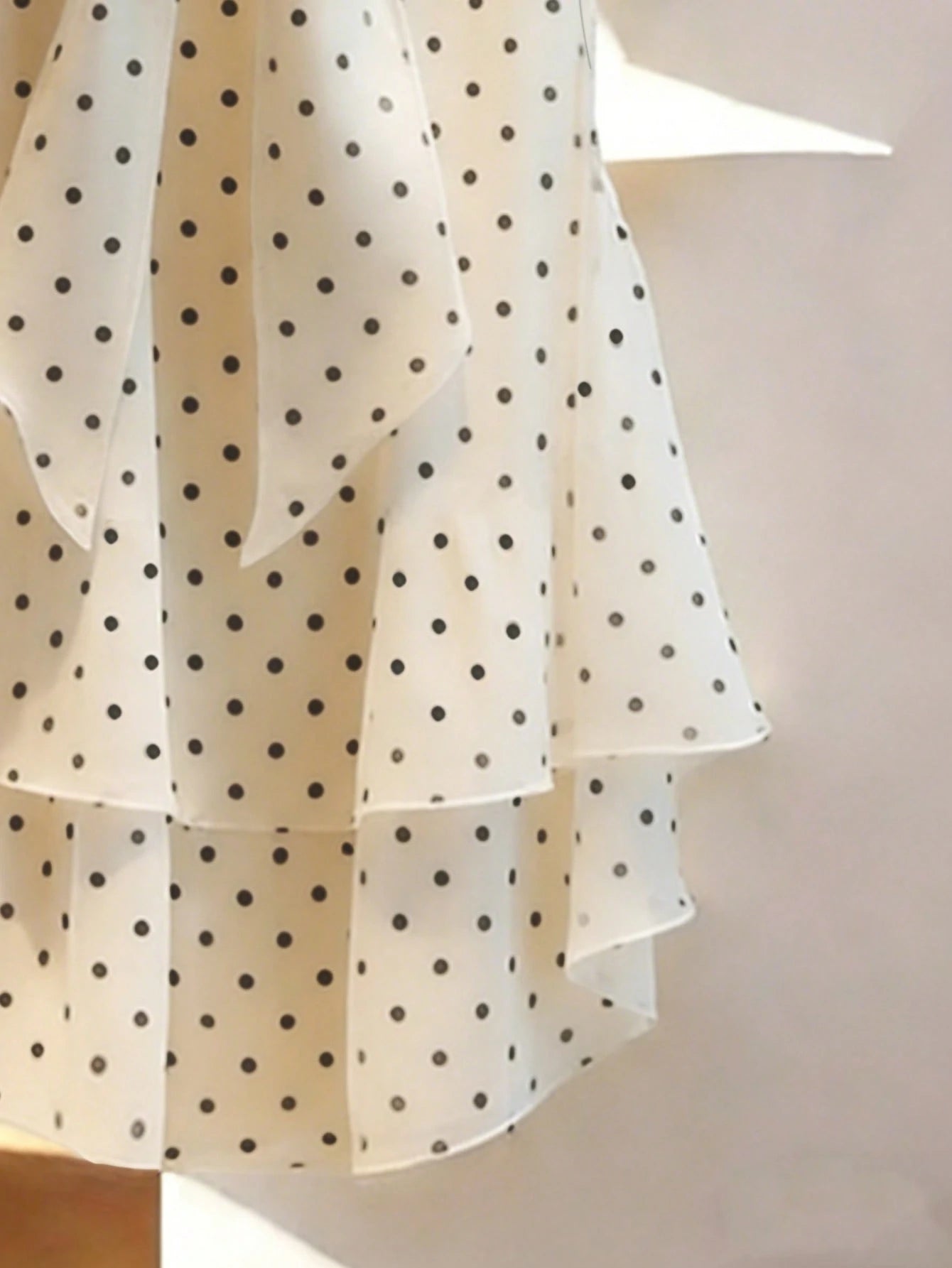 GlowEve Women's Polka Dot Print Tie Collar Ruffle Hem Sleeveless Blouse