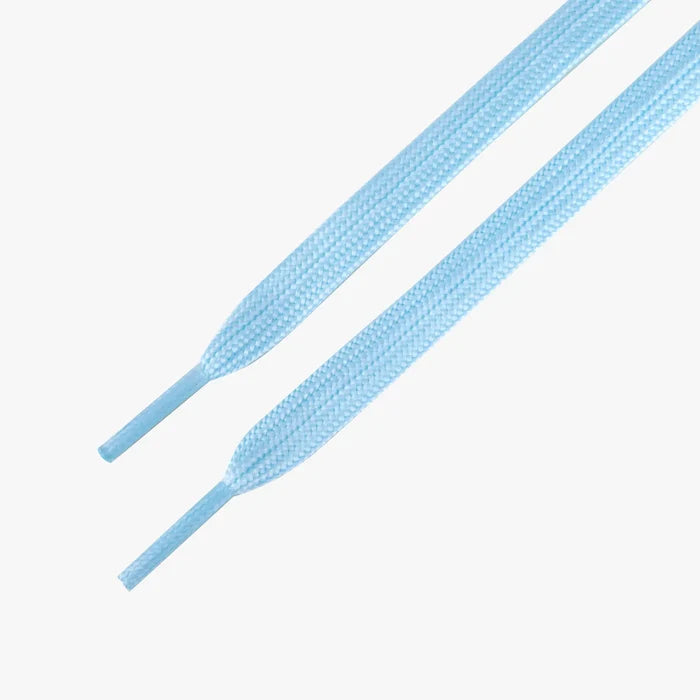 Pair of light blue shoelaces on a white background