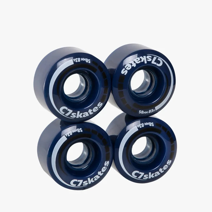Four blue C7skates wheels on a white background