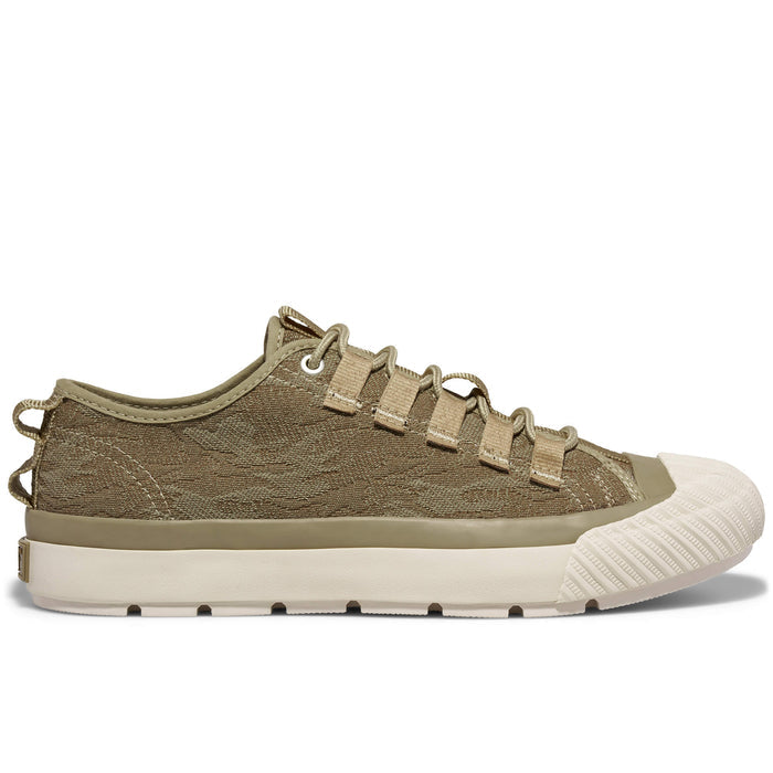 A tan camo-patterned low-top sneaker shown on a white background.