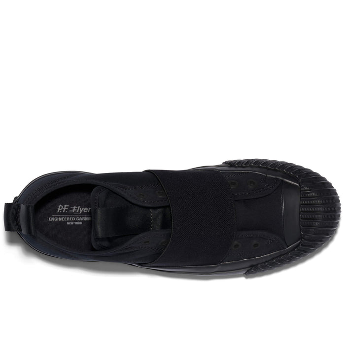 Black sandal with 'P.F. Flyers' branding on a white background