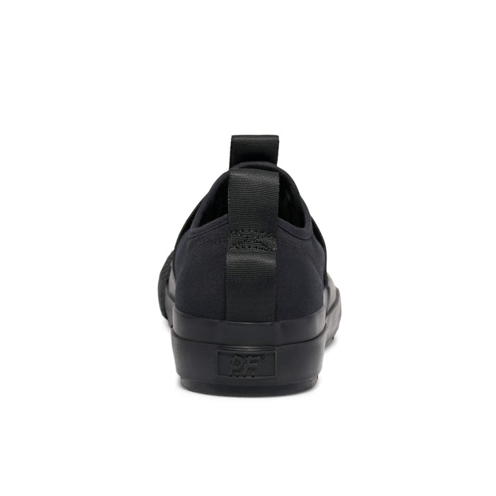 Black slip-on sneaker on a white background
