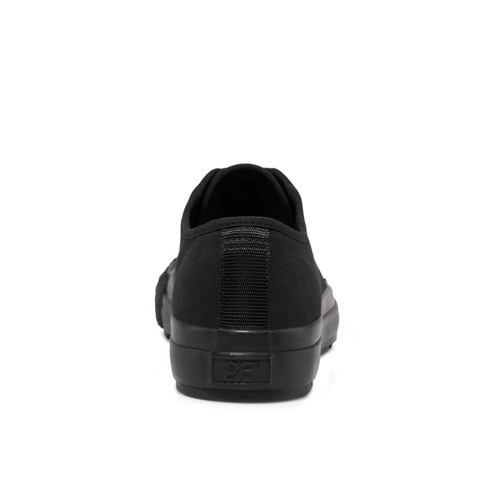 Black low-top sneaker on a white background.