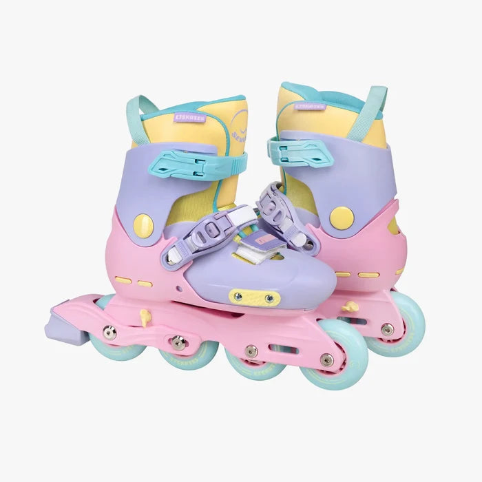 Set of colorful inline skates on a white background