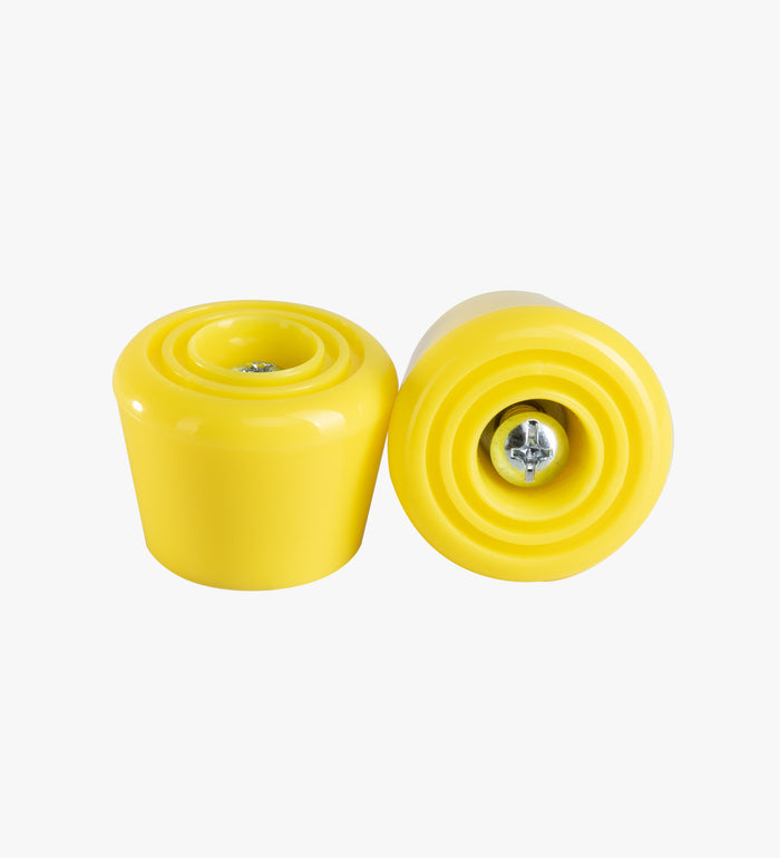 Two yellow stoppers on a white background
