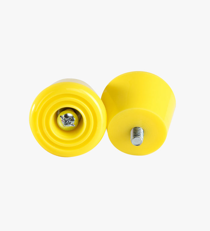 Two yellow stoppers on a white background
