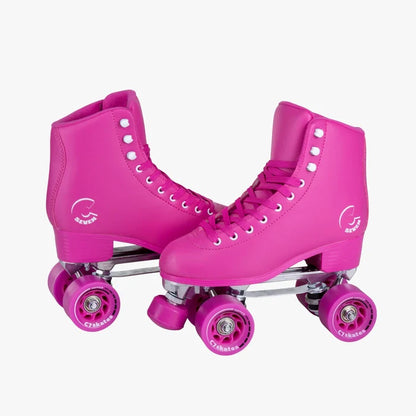 Pair of pink roller skates with visible brand logo on a white background