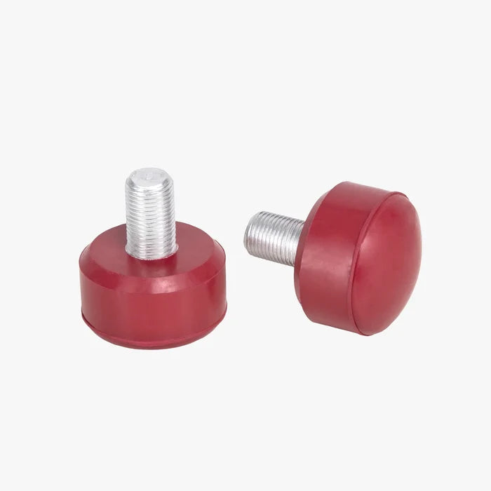 Two red metal screws with threaded shafts on a white background