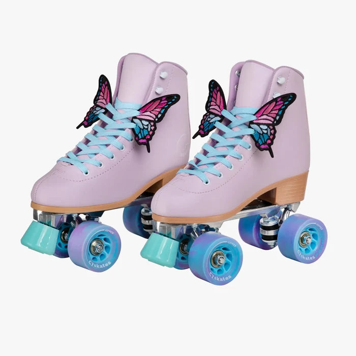 Pair of pink roller skates with butterfly decorations on a white background