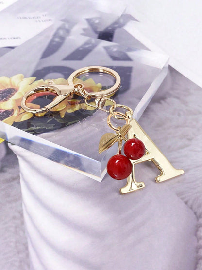 Premium Elegant Gold Letter Keychain, A-Z 3D Letter Pendant, Cherry Ornament, Fashionable Alloy Keychain, Bag/Backpack Hanging Decoration, Car Key Chain, Perfect Daily Accessory For Women, Couples Gif