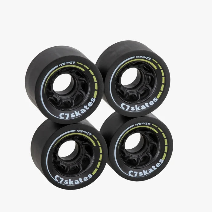 Four black C7skates wheels on a white background
