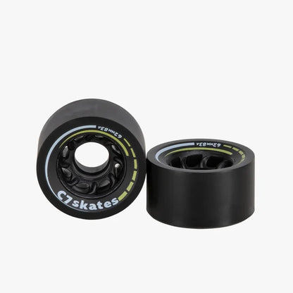 Two black skateboard wheels with visible branding on a white background