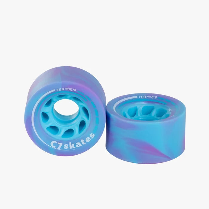 Two blue and purple C7 skates wheels on a white background