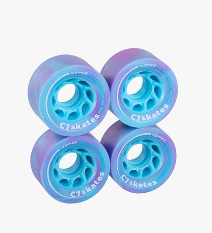 Four blue and purple C7skates wheels on a white background