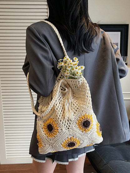 This Sunflower-Themed Hand-Crocheted Wool Tote Bag Is A Fashionable And Versatile Casual Women's Shoulder Bag. It Features Tassel Decoration, Lining, And A Drawstring Closure Design. Perfect For Beach