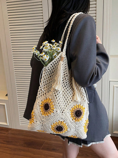 This Sunflower-Themed Hand-Crocheted Wool Tote Bag Is A Fashionable And Versatile Casual Women's Shoulder Bag. It Features Tassel Decoration, Lining, And A Drawstring Closure Design. Perfect For Beach