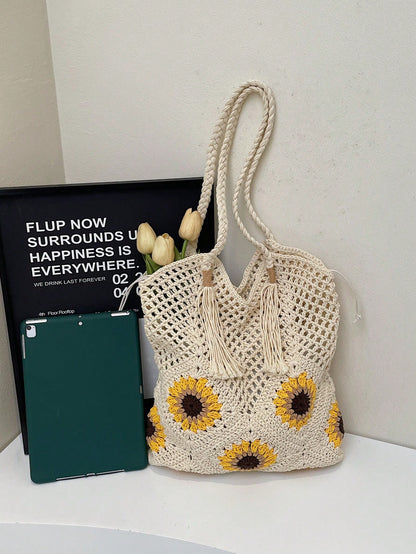 This Sunflower-Themed Hand-Crocheted Wool Tote Bag Is A Fashionable And Versatile Casual Women's Shoulder Bag. It Features Tassel Decoration, Lining, And A Drawstring Closure Design. Perfect For Beach