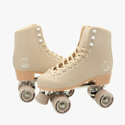 Pair of beige roller skates on a white background