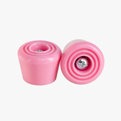 Two pink stoppers on a white background